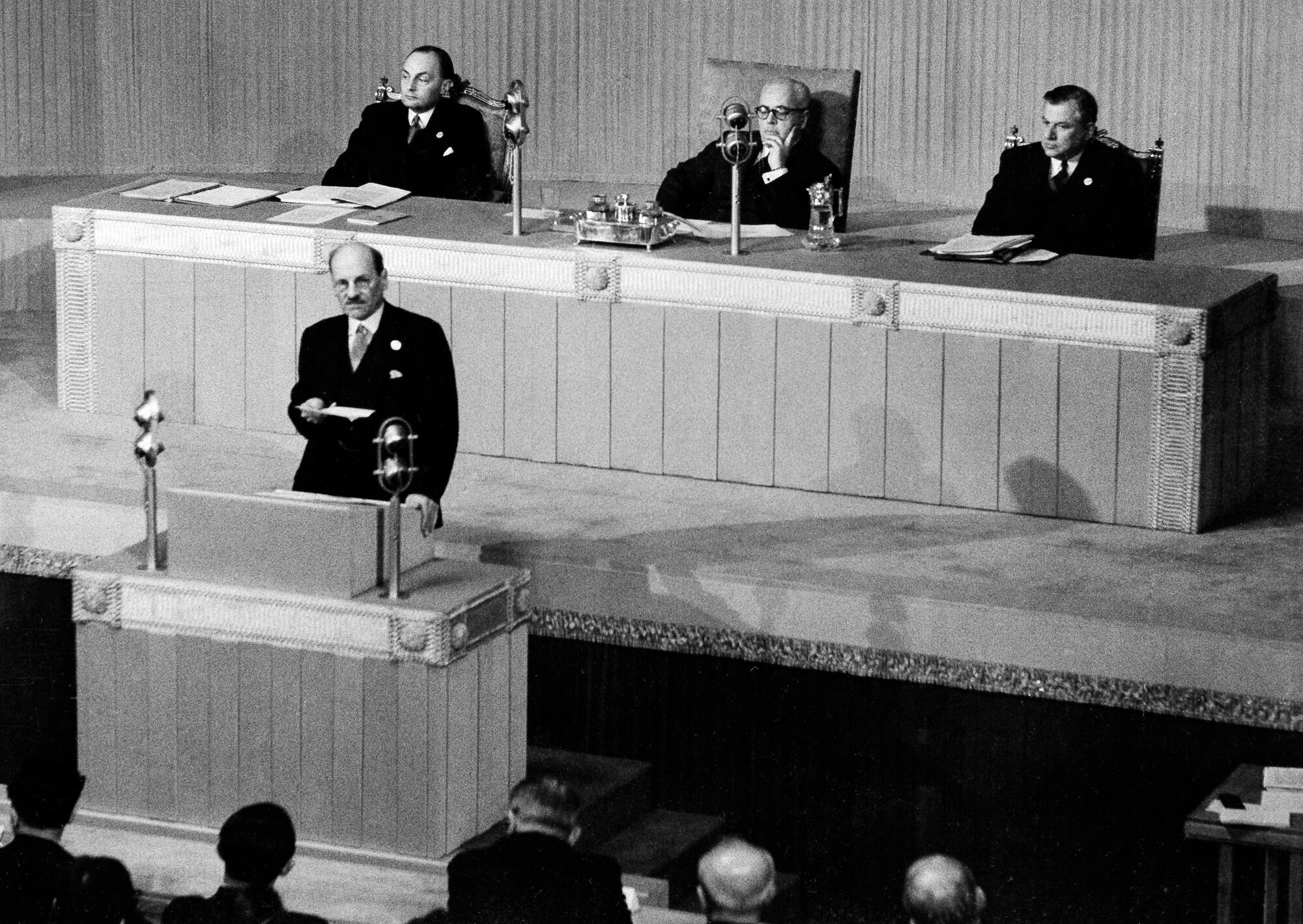 The first session of the United Nations General Assembly opened on 10 January 1946 at Central Hall in London, United Kingdom. 
A general view of the meeting hall as Clement Attlee, Prime Minister of the United Kingdom, addresses the General Assembly.