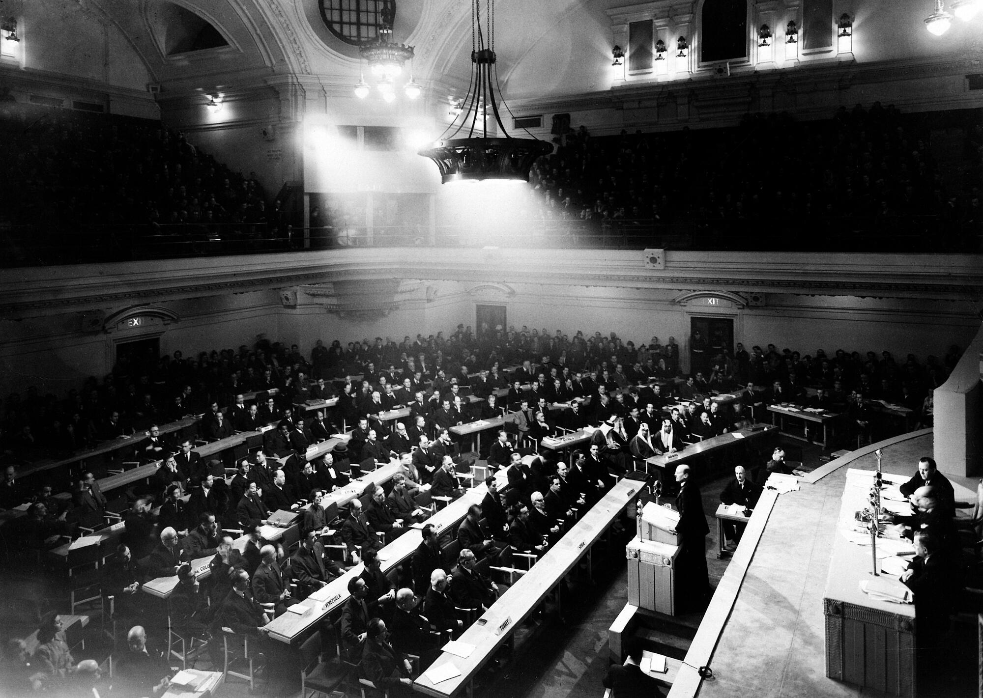 The first session of the United Nations General Assembly opened on 10 January  1946 at Central Hall in London, United Kingdom. 

A general view of Central Hall showing the delegation of the United Kingdom.