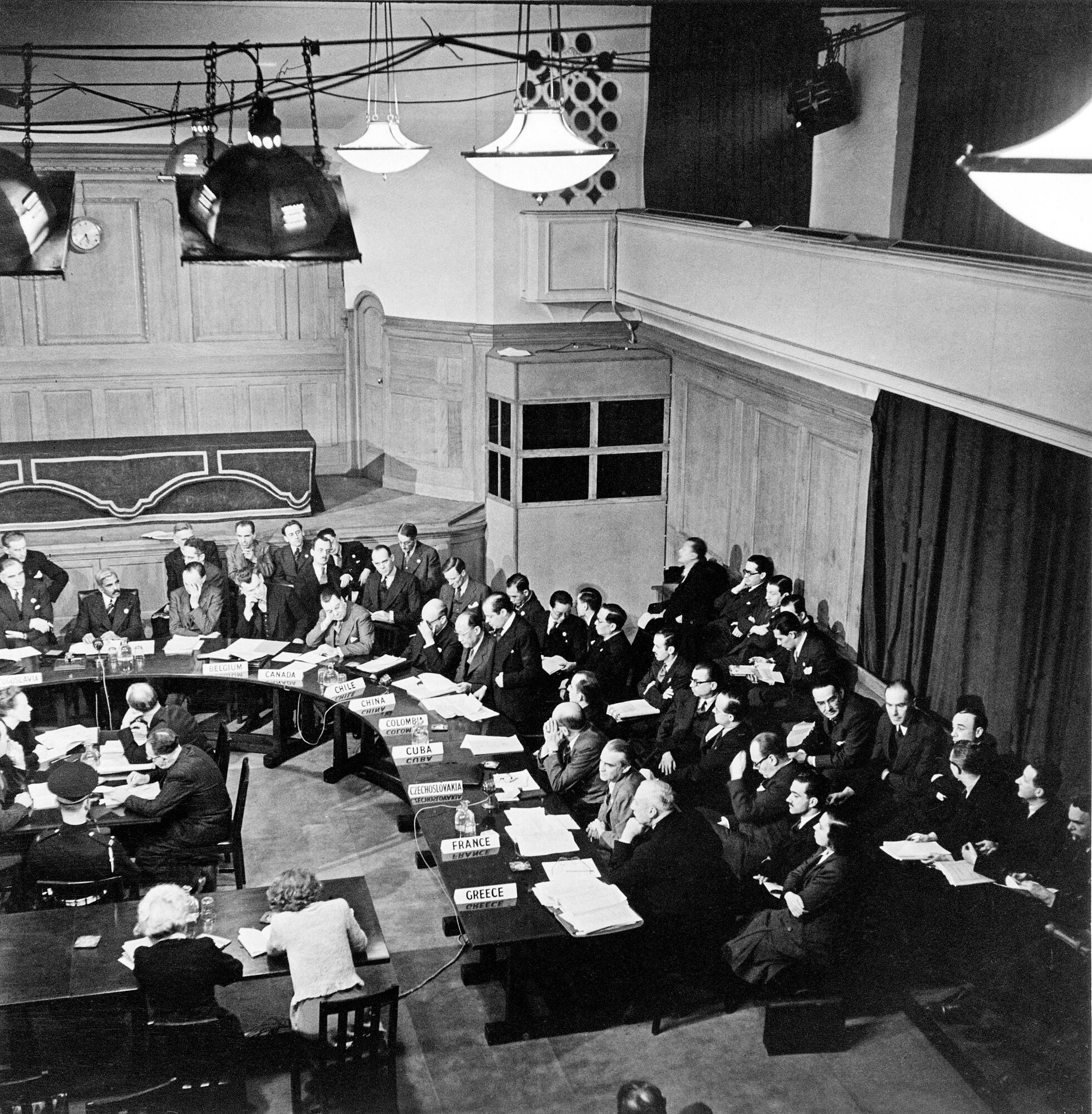 The first session of the United Nations General Assembly opened on 10 January 1946 at Central Hall in London, United Kingdom. 
The delegates of the First  Economic and Social Council of the United Nations shortly after the election of Sir Ramaswami Mudaliar (India), as its Chairman.