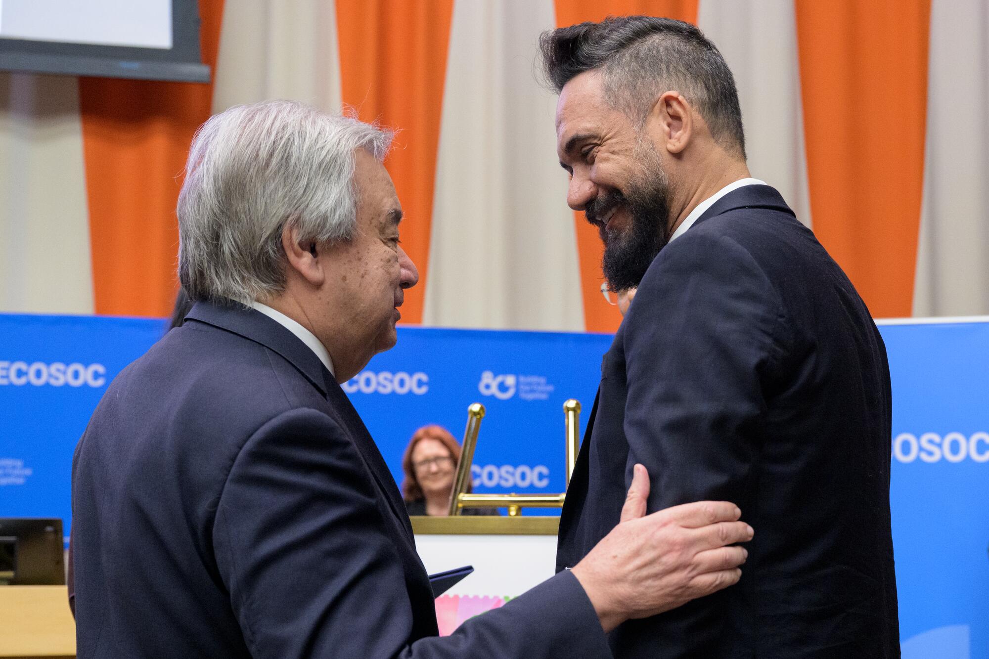 Secretary-General António Guterres (left) speaks with Eduardo Kobra, artist, (right) during the special meeting on the commemoration of the eightieth anniversary of the Economic and Social Council entitled “ECOSOC80: A Turning Point for Multilateralism”.

A stamp was unveiled with a motive of the mural painted by Eduardo Kobra during the event. Mr. Kobra is from São Paulo, Brazil and the mural was a donation from the Permanent Mission of Brazil, tied to the commemoration of the 200th year anniversary of Brazil's Independence (7 September 1822). The theme of the artwork is Sustainable Development, in particular the concept of meeting the needs of the present without compromising Earth’s ability to meet the needs of future generations. The mural was installed on the west façade of the Dag Hammarskjöld Library Building in September 2022.